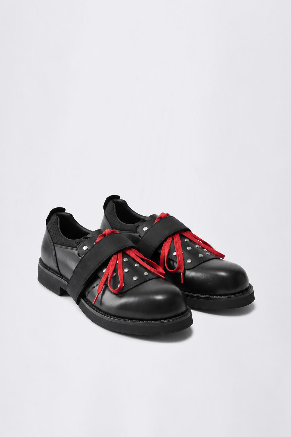 GR10K STUDDED ASPHALT DERBY II IN BLACK
