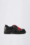 GR10K STUDDED ASPHALT DERBY II IN BLACK